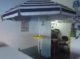 Mesa portátil para guarda sol